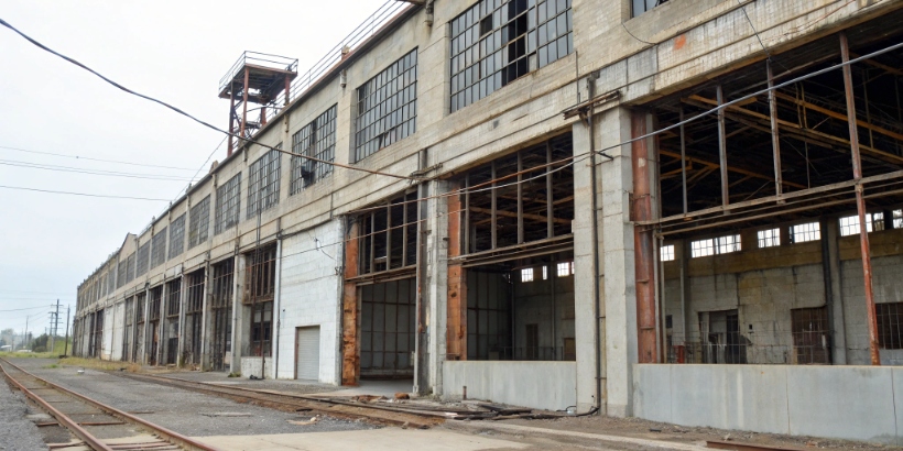 A factory building with visible safety deficiencies