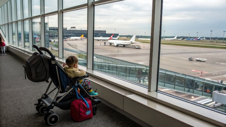 alt with keywords: Stroller on airplane